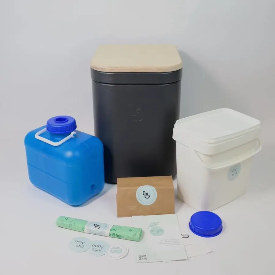 Kit de baño seco separador Trelino: inodoro con tapa de madera, bidón azul para la orina, cubo blanco para los sólidos, bolsas compostables y material de cobertura